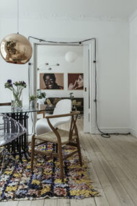 scandi boho apartment, scandi boho style, home tour denmark, tom dixon copper lamp, boucheroite colourful rug
